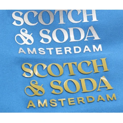 Discover our custom 3D silicone heat transfer labels featuring unique brush dots. Perfect for adding a high-quality, soft touch to your logo designs.