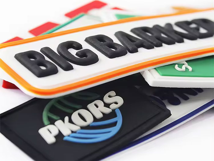 Design your own custom 3D rubber patches! Our high-quality PVC rubber patches are perfect for hats and gear, featuring your logo. Enjoy wholesale prices and free shipping!